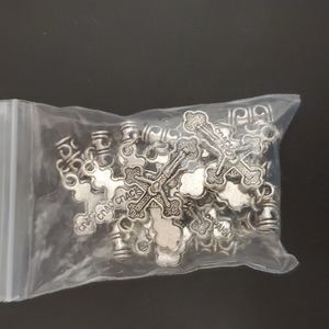 Dangle cross charms